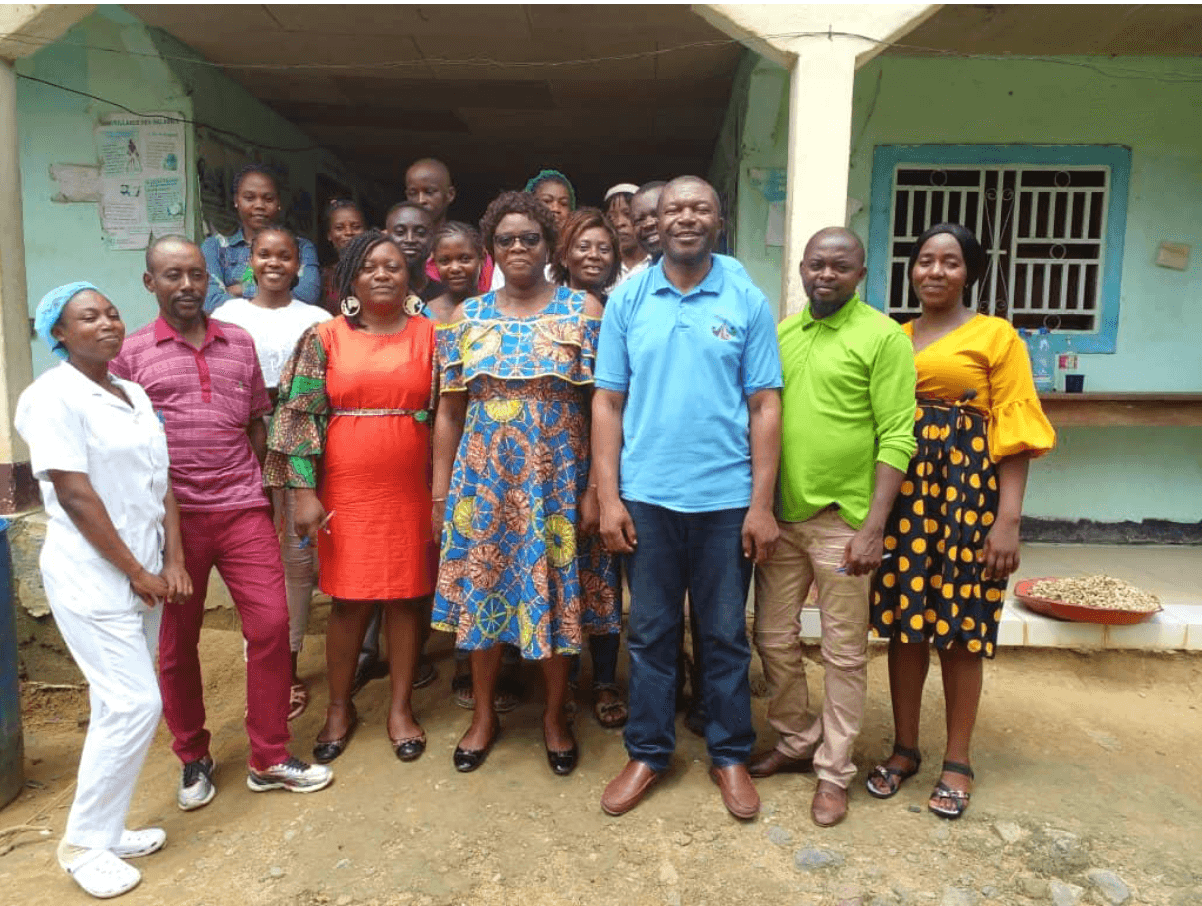 Close-up of group standing outside clinic